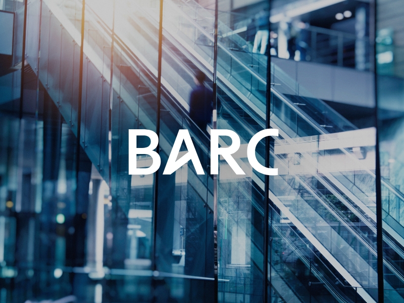 Bild eines Foyers, in der Mitte das BARC Logo